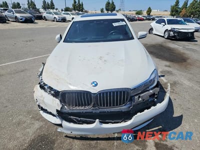 Piąte zdjęcie samochodu w środku: 2019 BMW 740 I VIN:WBA7E2C55KB217440 - miniatura