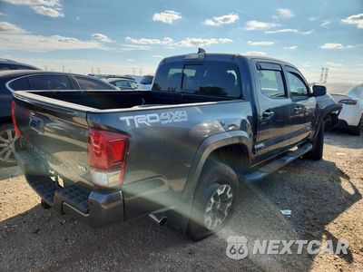 Trzecie zdjęcie samochodu z tyłu: 2017 TOYOTA TACOMA TRD OFF-ROAD VIN:3TMCZ5AN5HM094783 - miniatura