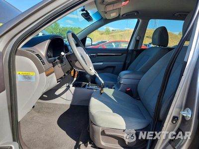 Zdjęcie 7 z 13 samochodu: 2010 HYUNDAI SANTA FE GLS VIN:5NMSGDAB7AH400747 - miniatura