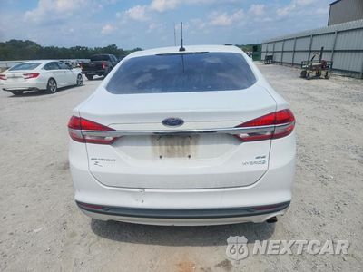 Zdjęcie 6 z 12 samochodu: 2017 FORD FUSION SE HYBRID VIN:3FA6P0LU7HR386759 - miniatura