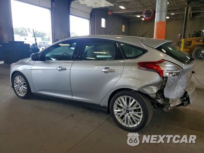 Drugie zdjęcie samochodu z przodu: 2016 FORD FOCUS TITANIUM VIN:1FADP3N20GL307465 - miniatura