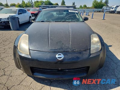 Piąte zdjęcie samochodu w środku: 2004 NISSAN 350Z BASE VIN:JN1AZ34EX4T064152 - miniatura
