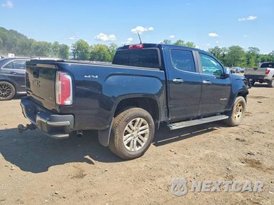 Trzecie zdjęcie samochodu z tyłu: 2016 GMC CANYON SLT VIN:1GTG6DE37G1349586 - miniatura