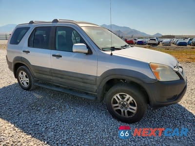 Czwarte zdjęcie samochodu z boku: 2002 HONDA CR-V EX VIN:JHLRD78842C071561 - miniatura