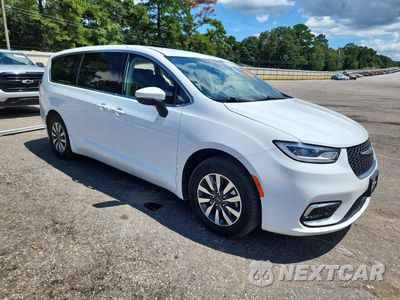 Czwarte zdjęcie samochodu z boku: 2023 CHRYSLER PACIFICA HYBRID TOURING L VIN:2C4RC1L78PR622391 - miniatura