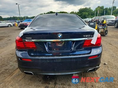Zdjęcie 6 z 12 samochodu: 2014 BMW 750 LXI VIN:WBAYF8C58ED142505 - miniatura
