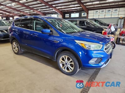 Czwarte zdjęcie samochodu z boku: 2017 FORD ESCAPE SE VIN:1FMCU9GD7HUE61419 - miniatura