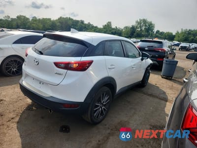 Trzecie zdjęcie samochodu z tyłu: 2018 MAZDA CX-3 TOURING VIN:JM1DKFC78J0311989 - miniatura