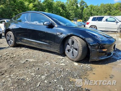 Czwarte zdjęcie samochodu z boku: 2021 TESLA MODEL 3 VIN:5YJ3E1EA0MF976390 - miniatura