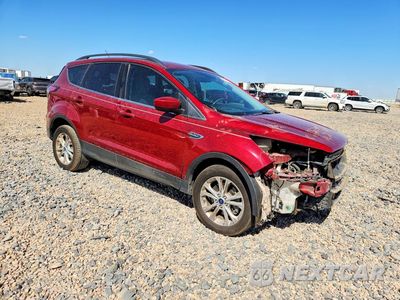 Czwarte zdjęcie samochodu z boku: 2018 FORD ESCAPE SE VIN:1FMCU9GD7JUA99324 - miniatura