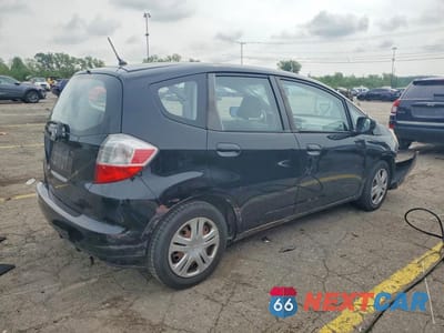 Trzecie zdjęcie samochodu z tyłu: 2010 HONDA FIT VIN:JHMGE8H21AC038260 - miniatura
