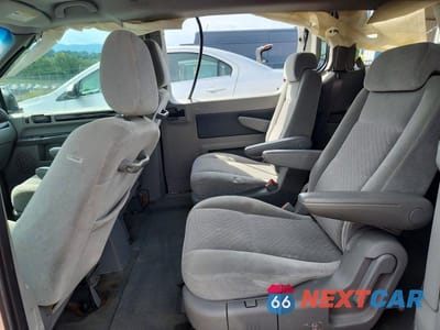 Zdjęcie 11 z 13 samochodu: 2006 FORD FREESTAR SEL VIN:2FMDA52246BA13797 - miniatura