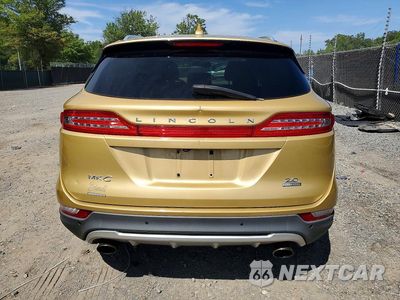 Zdjęcie 6 z 12 samochodu: 2015 LINCOLN MKC VIN:5LMCJ1A97FUJ10941 - miniatura