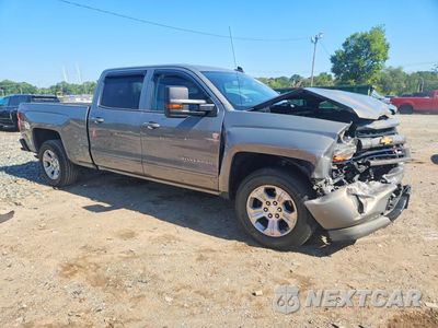 Czwarte zdjęcie samochodu z boku: 2017 CHEVROLET SILVERADO K1500 LT VIN:3GCUKREC5HG312051 - miniatura
