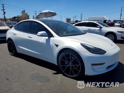 Czwarte zdjęcie samochodu z boku: 2022 TESLA MODEL 3 VIN:5YJ3E1EB0NF178482 - miniatura