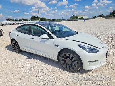 Czwarte zdjęcie samochodu z boku: 2023 TESLA MODEL 3 VIN:5YJ3E1EC5PF486047 - miniatura