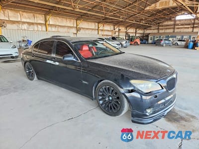 Czwarte zdjęcie samochodu z boku: 2012 BMW 750 LI VIN:WBAKB8C55CC962822 - miniatura
