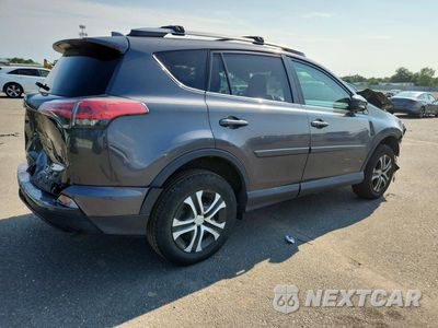 Trzecie zdjęcie samochodu z tyłu: 2018 TOYOTA RAV4 LE VIN:2T3ZFREV1JW449103 - miniatura