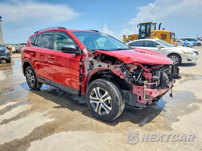 Czwarte zdjęcie samochodu z boku: 2017 TOYOTA RAV4 LE VIN:JTMZFREV6HJ134922 - miniatura