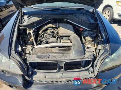 Zdjęcie 12 z 13 samochodu: 2013 BMW X5 XDRIVE35I VIN:5UXZV4C50D0B07371 - miniatura