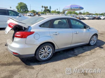 Trzecie zdjęcie samochodu z tyłu: 2015 FORD FOCUS TITANIUM VIN:1FADP3J23FL256211 - miniatura