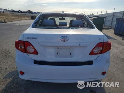 Zdjęcie 6 z 12 samochodu: 2009 TOYOTA COROLLA LE VIN:JTDBL40EX9J011596 - miniatura