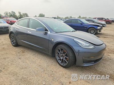 Czwarte zdjęcie samochodu z boku: 2020 TESLA MODEL 3 VIN:5YJ3E1EB9LF663846 - miniatura