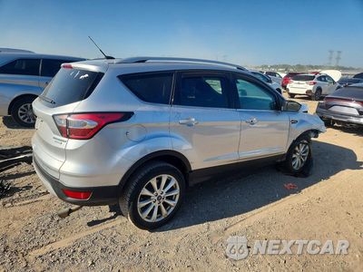 Trzecie zdjęcie samochodu z tyłu: 2017 FORD ESCAPE TITANIUM VIN:1FMCU0J99HUD94693 - miniatura