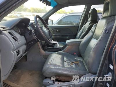 Zdjęcie 7 z 12 samochodu: 2004 HONDA PILOT EXL VIN:2HKYF18524H587852 - miniatura