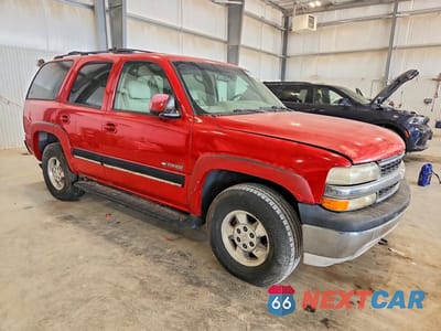 Czwarte zdjęcie samochodu z boku: 2001 CHEVROLET TAHOE K1500 VIN:1GNEK13T61R117551 - miniatura