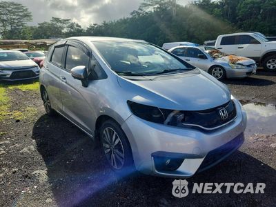 Czwarte zdjęcie samochodu z boku: 2016 HONDA FIT EX VIN:JHMGK5H72GX037557 - miniatura
