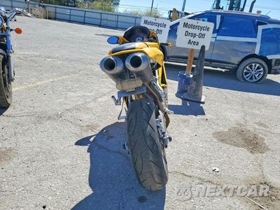 Czwarte zdjęcie samochodu z boku: 2004 DUCATI 749 BIPOSTO VIN:ZDM1UB3SX4B006081 - miniatura