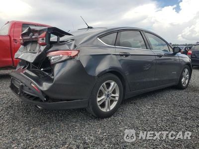 Trzecie zdjęcie samochodu z tyłu: 2018 FORD FUSION SE HYBRID VIN:3FA6P0LU3JR274207 - miniatura