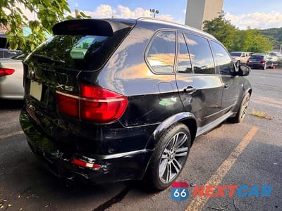 Czwarte zdjęcie samochodu z boku: 2013 BMW X5 XDRIVE50I VIN:5UXZV8C50D0C14959 - miniatura