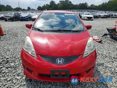Piąte zdjęcie samochodu w środku: 2010 HONDA FIT SPORT VIN:JHMGE8H49AC040730 - miniatura