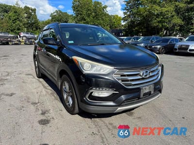 Czwarte zdjęcie samochodu z boku: 2017 HYUNDAI SANTA FE SPORT 2.4L VIN:5NMZUDLB0HH035794 - miniatura