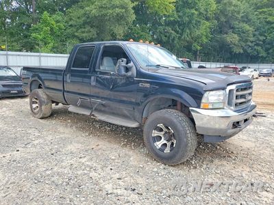 Czwarte zdjęcie samochodu z boku: 2002 FORD F350 SRW SUPER DUTY VIN:1FTSW31F72EC11827 - miniatura