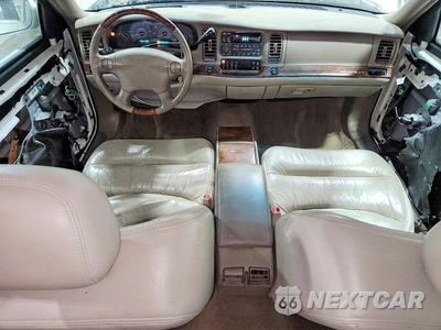 Zdjęcie 8 z 13 samochodu: 2004 BUICK PARK AVENUE ULTRA VIN:1G4CU541144161159 - miniatura