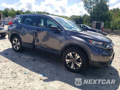 Czwarte zdjęcie samochodu z boku: 2017 HONDA CR-V LX VIN:2HKRW6H36HH211001 - miniatura