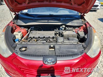 Zdjęcie 12 z 13 samochodu: 2010 HYUNDAI TUCSON GLS VIN:KM8JUCAC6AU042472 - miniatura