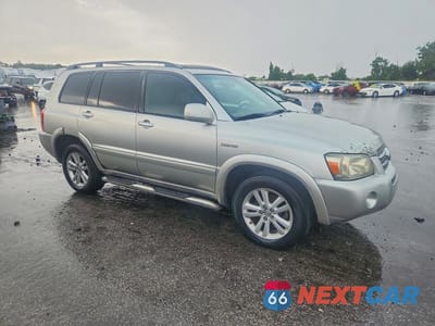 Czwarte zdjęcie samochodu z boku: 2006 TOYOTA HIGHLANDER HYBRID VIN:JTEEW21A460007853 - miniatura