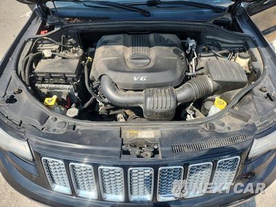 Zdjęcie 12 z 13 samochodu: 2014 JEEP GRAND CHEROKEE SUMMIT VIN:1C4RJFJG2EC531614 - miniatura