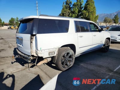 Trzecie zdjęcie samochodu z tyłu: 2017 GMC YUKON XL DENALI VIN:1GKS2HKJ2HR345176 - miniatura