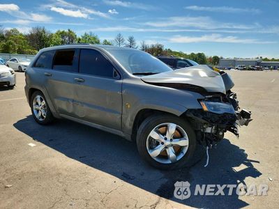 Czwarte zdjęcie samochodu z boku: 2021 JEEP GRAND CHEROKEE TRACKHAWK VIN:1C4RJFN90MC668562 - miniatura
