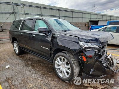 Czwarte zdjęcie samochodu z boku: 2021 CHEVROLET SUBURBAN K1500 HIGH COUNTRY VIN:1GNSKGKL7MR358191 - miniatura