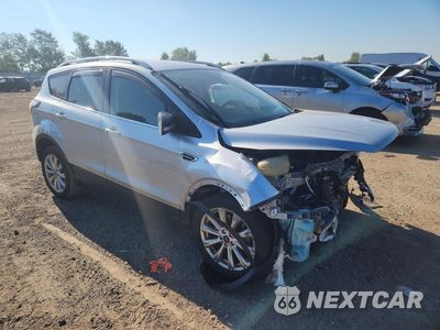 Czwarte zdjęcie samochodu z boku: 2017 FORD ESCAPE TITANIUM VIN:1FMCU0J99HUD94693 - miniatura