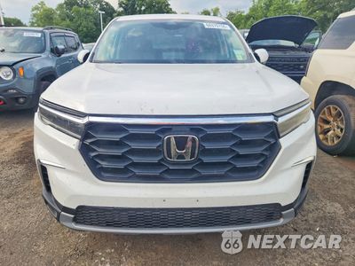 Piąte zdjęcie samochodu w środku: 2023 HONDA PILOT EXL VIN:5FNYG2H50PB010954 - miniatura
