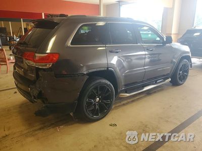 Trzecie zdjęcie samochodu z tyłu: 2014 JEEP GRAND CHEROKEE LAREDO VIN:1C4RJEAG2EC176776 - miniatura