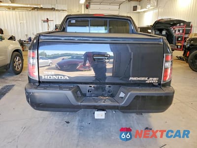 Zdjęcie 6 z 12 samochodu: 2014 HONDA RIDGELINE SPORT VIN:5FPYK1F71EB006803 - miniatura