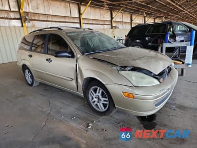 Czwarte zdjęcie samochodu z boku: 2000 FORD FOCUS SE VIN:1FAFP3630YW229639 - miniatura